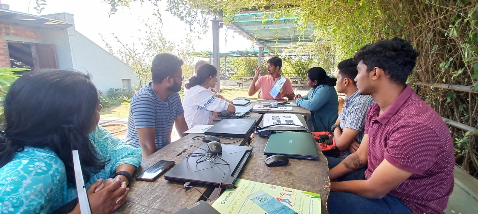 Colleagues working together at an outdoor table